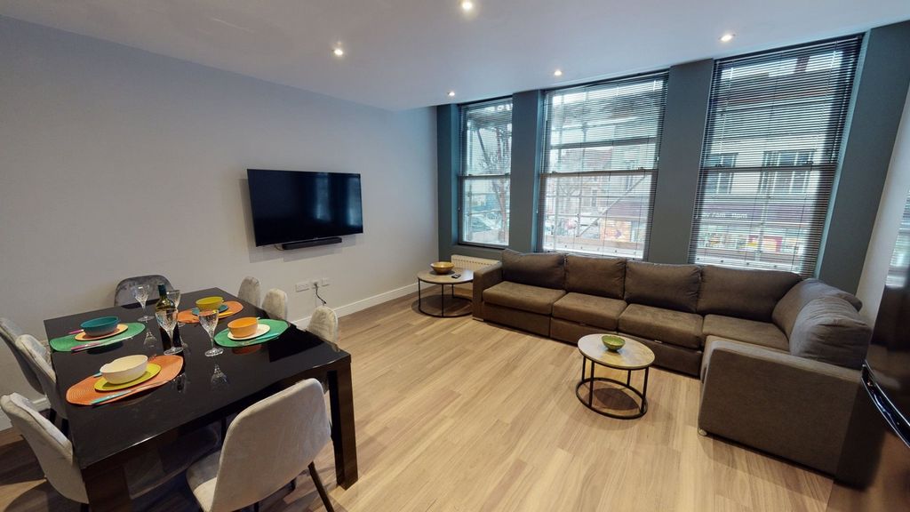 Property photo 2 of 15 A Spacious And Inviting Modern Living Room, Perfec...