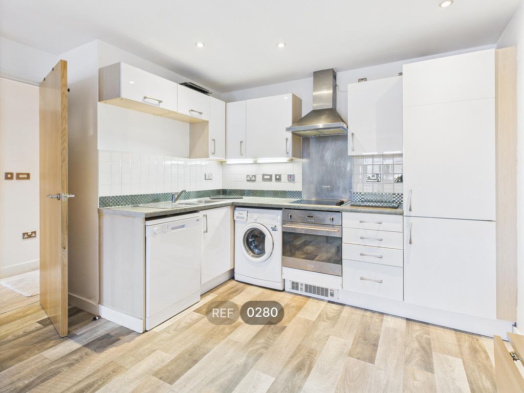 Property photo 1 of 12 Kitchen & Living Area