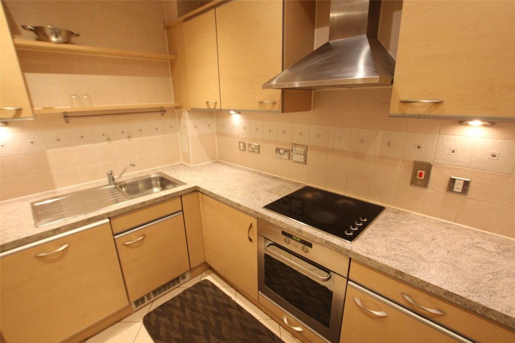 Property photo 3 of 8 Kitchen