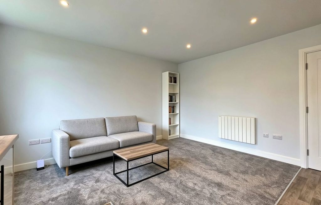 Property photo 2 of 16 Living Area