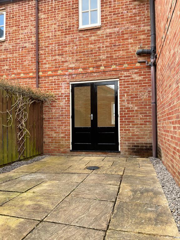 Property photo 2 of 13 Rear Entrance Into The Living Room