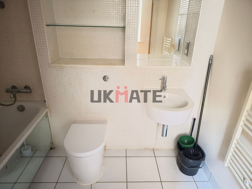 Property photo 3 of 9 Functional Bathroom Featuring A Toilet, A Small Si...