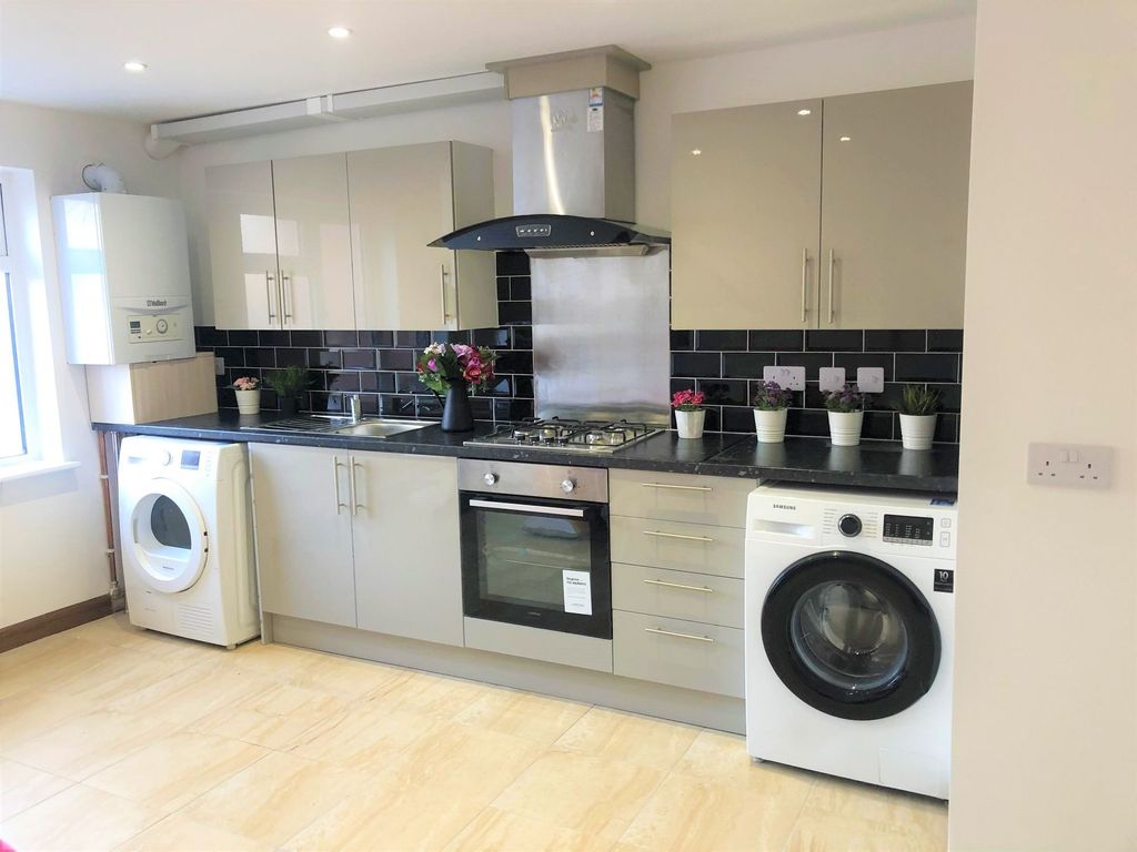Property photo 3 of 14 Bright, Modern Kitchen With Sleek Cabinetry, Integ...