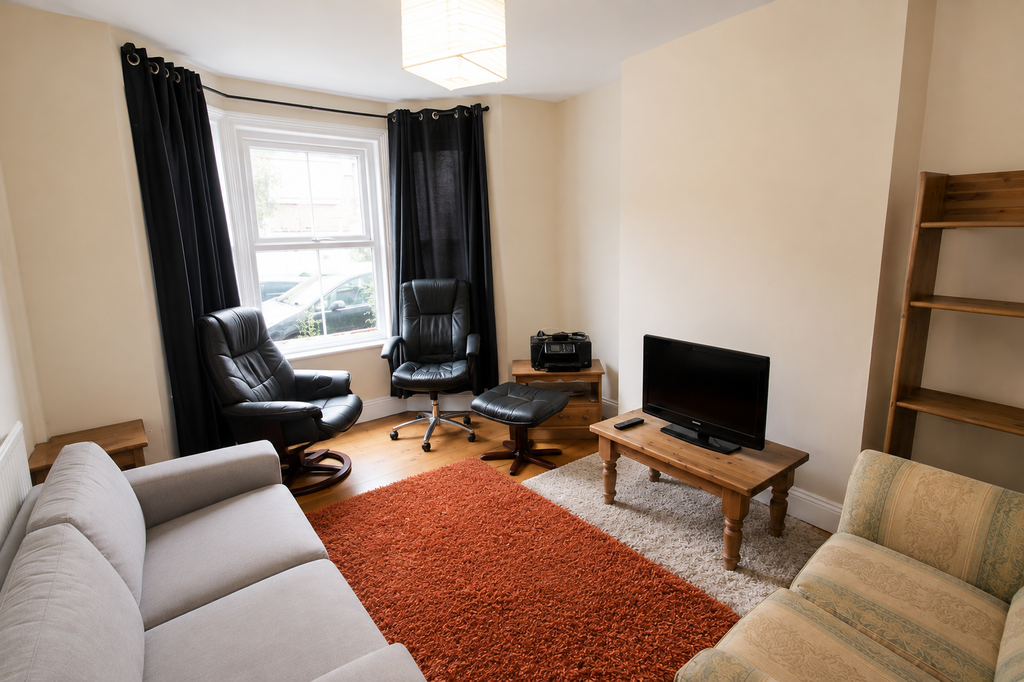 Property photo 2 of 12 Living Room - Angle 1