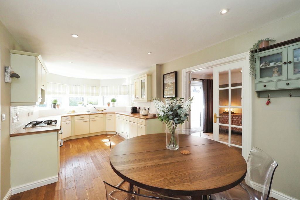 Property photo 2 of 21 Stunning Open Plan Kitchen/Dining With Feature Window Filtering Through Natural Light
