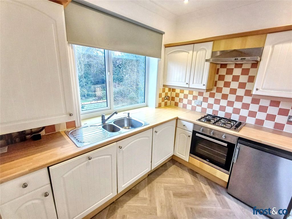 Property photo 3 of 12 Kitchen