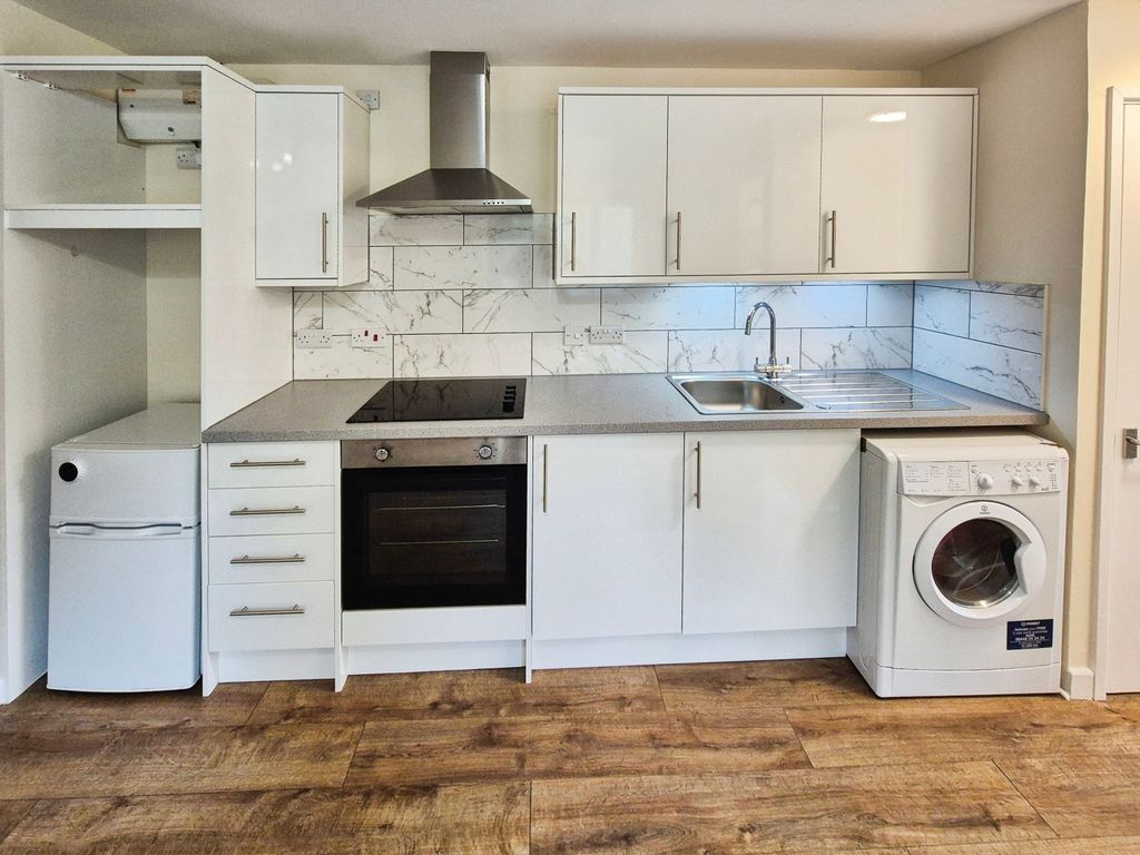 Property photo 3 of 7 Kitchen Area