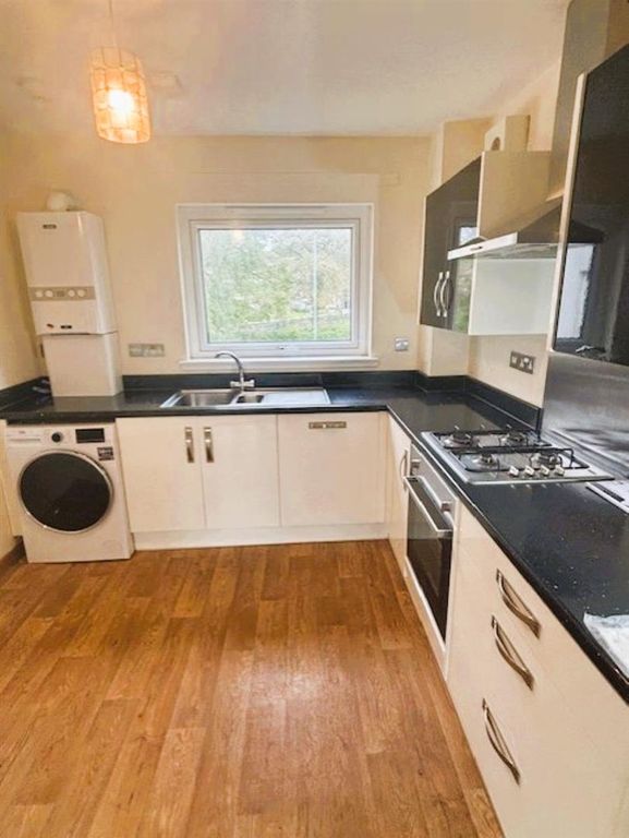 Property photo 3 of 8 Kitchen