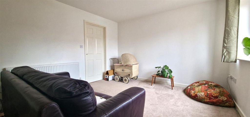 Property photo 3 of 4 Sitting Room