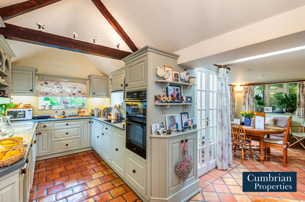 Property photo 2 of 26 Dining Kitchen
