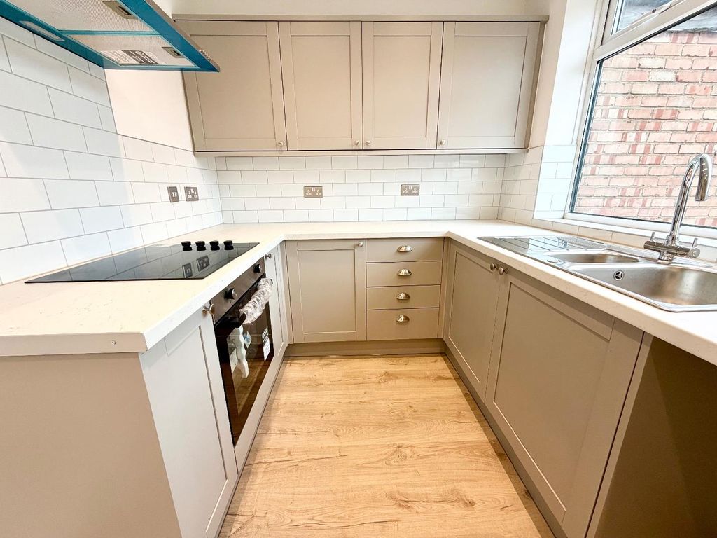 Property photo 2 of 12 Kitchen