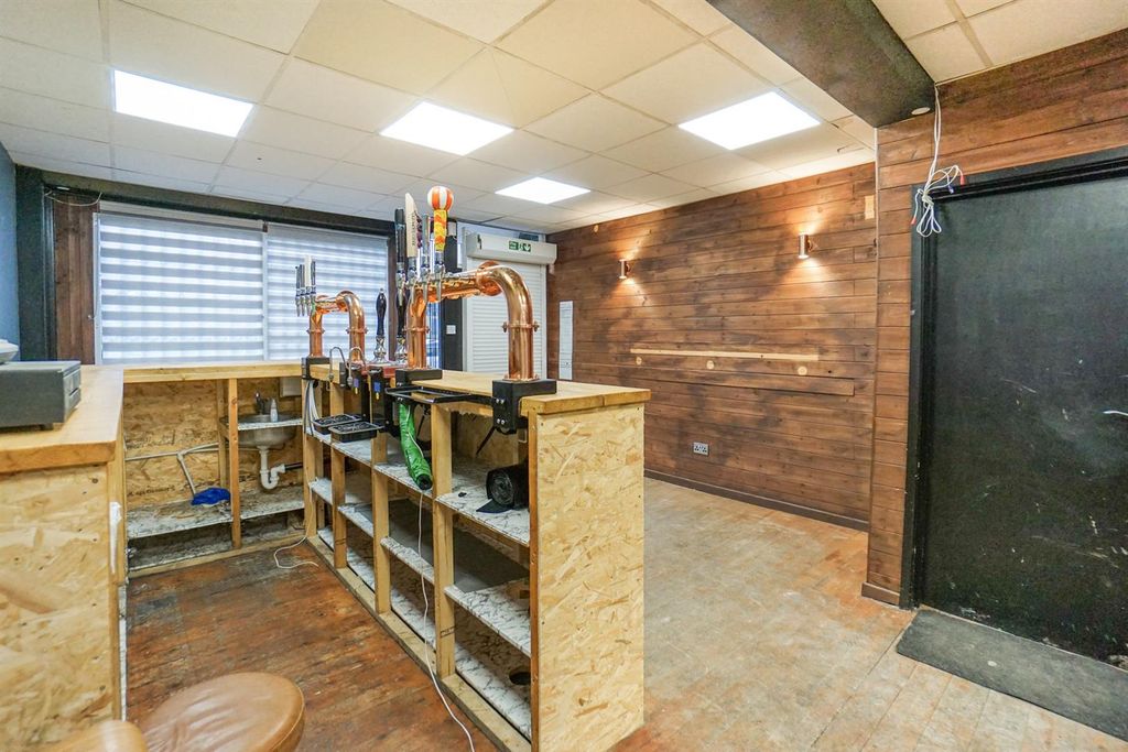 Property photo 3 of 11 Bar Area