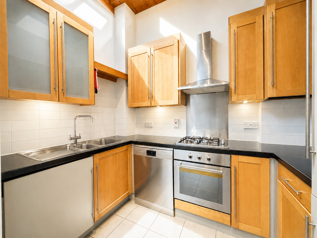 Property photo 3 of 9 Kitchen
