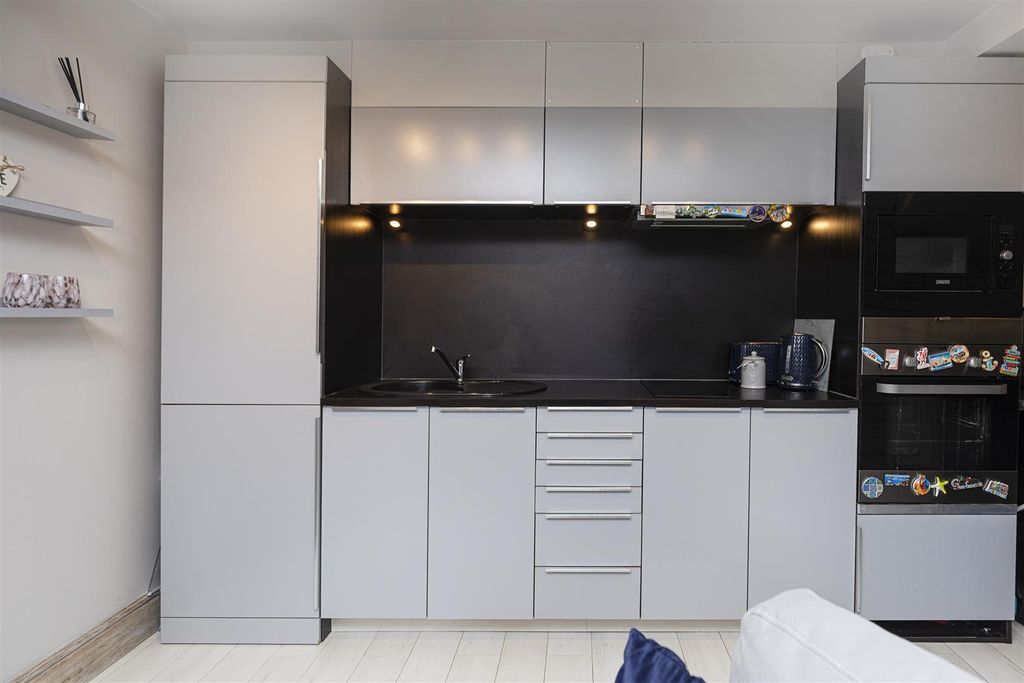 Property photo 3 of 20 Kitchen Area