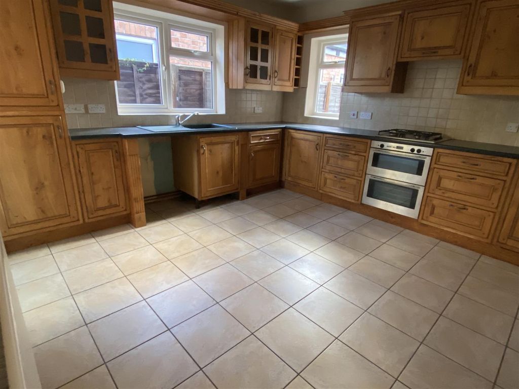 Property photo 2 of 13 108Dr-Dining Kitchen.Jpg