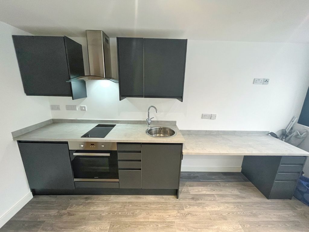 Property photo 3 of 5 Kitchen Area