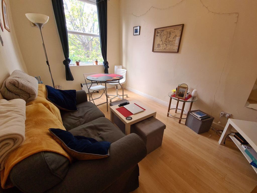 Property photo 2 of 8 Cozy Living Room With A Comfortable Sofa, Natural ...