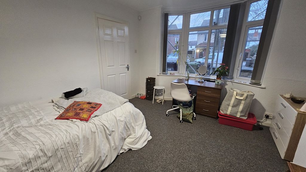 Property photo 1 of 14 A Bright And Welcoming Master Bedroom Featuring A ...