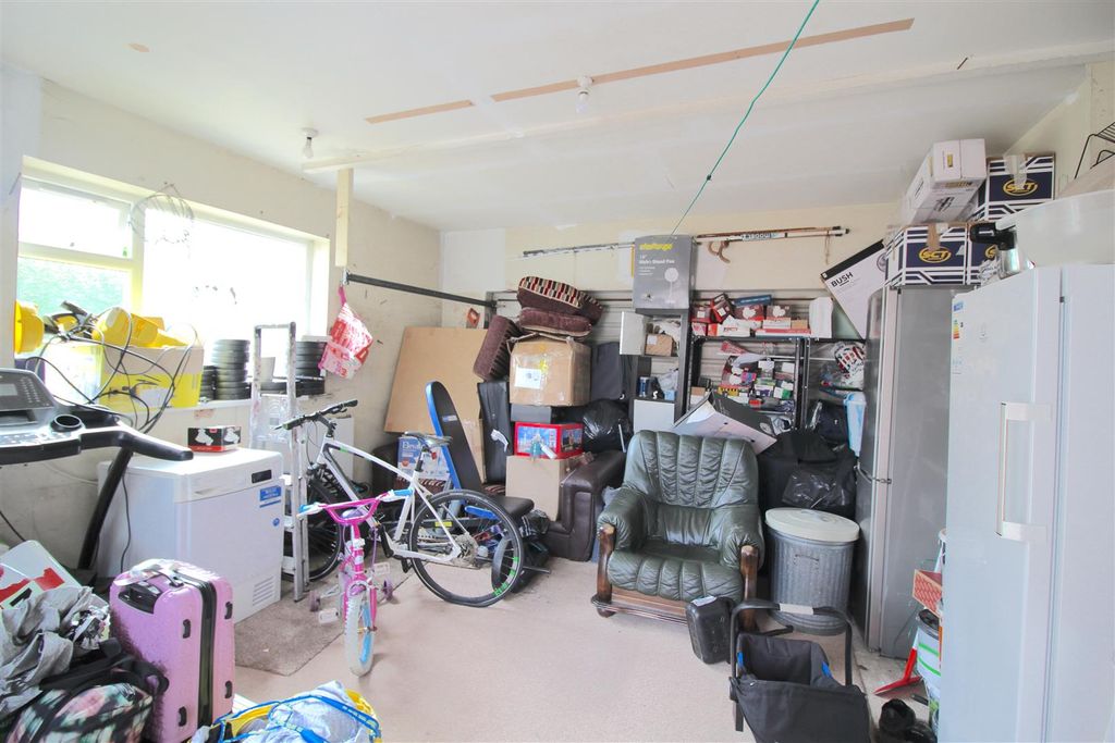 Property photo 2 of 13 Garage