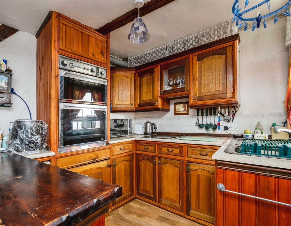 Property photo 3 of 7 Kitchen Area