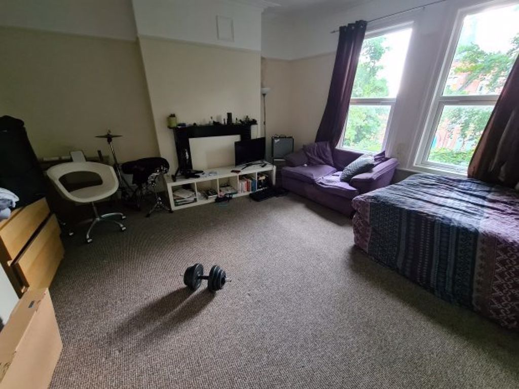 Property photo 3 of 6 Bright And Spacious Master Bedroom Featuring A Com...