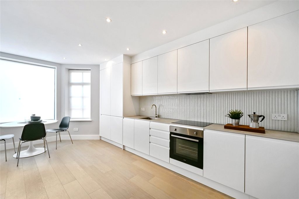 Property photo 3 of 12 Kitchen