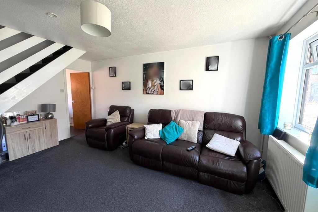 Property photo 3 of 11 Living Room.Jpg