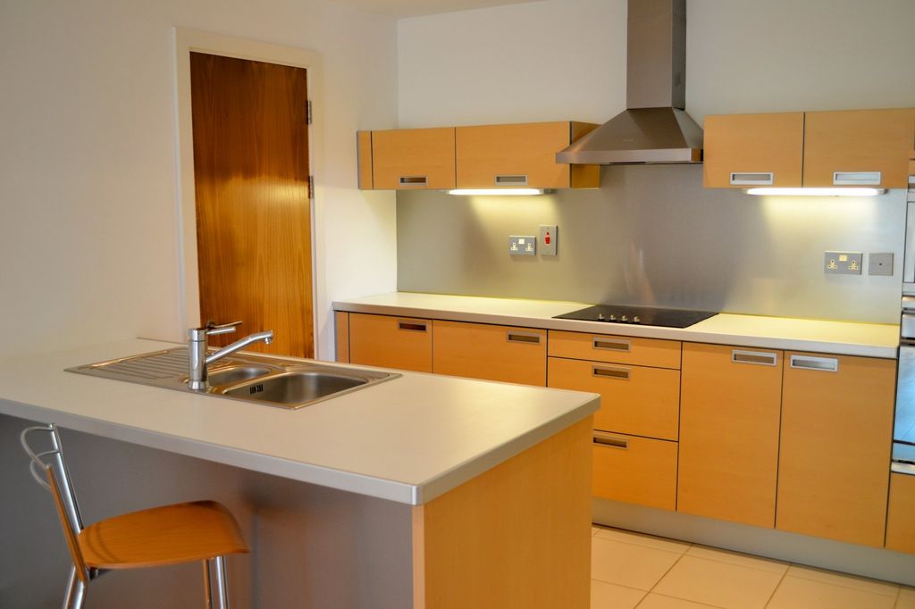 Property photo 3 of 8 Kitchen