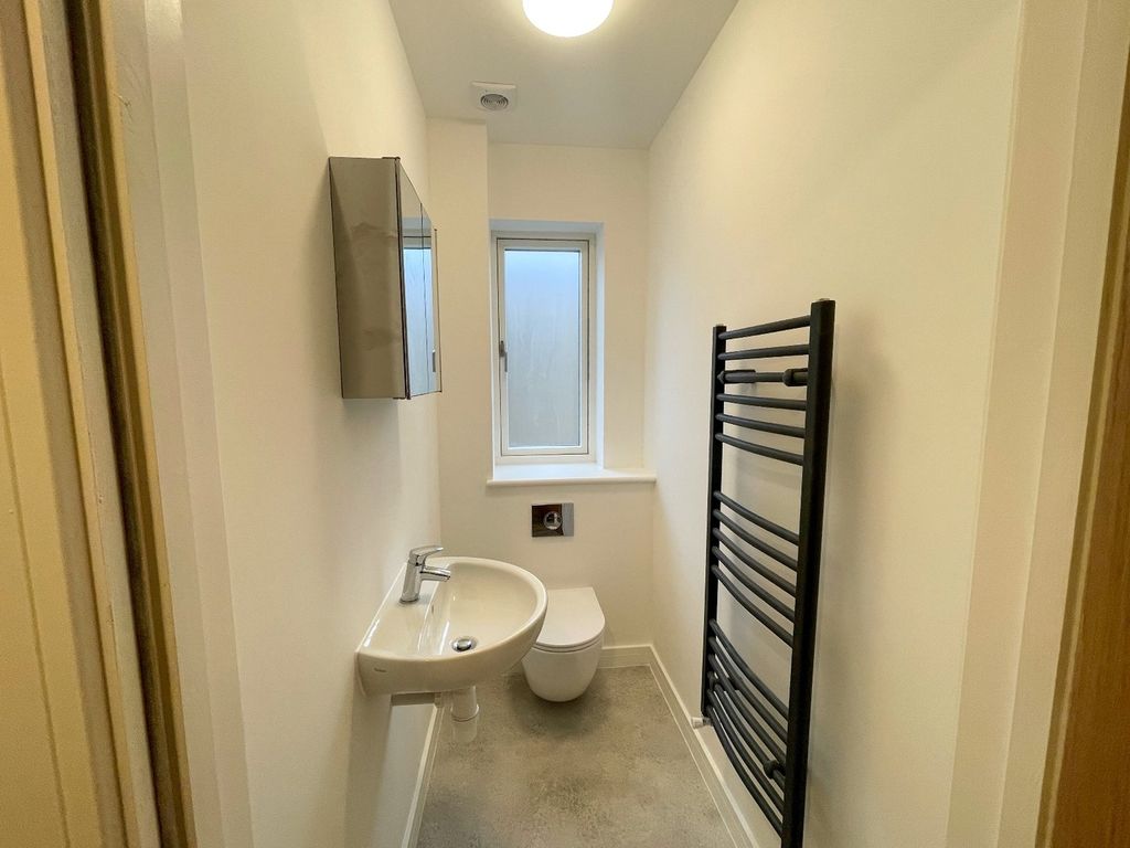Property photo 1 of 13 Modern Bathroom Featuring Sleek Fixtures And Ample...