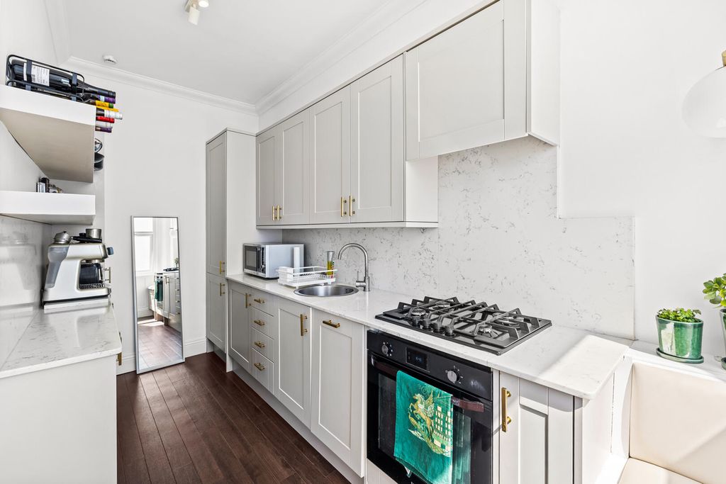 Property photo 3 of 12 Kitchen