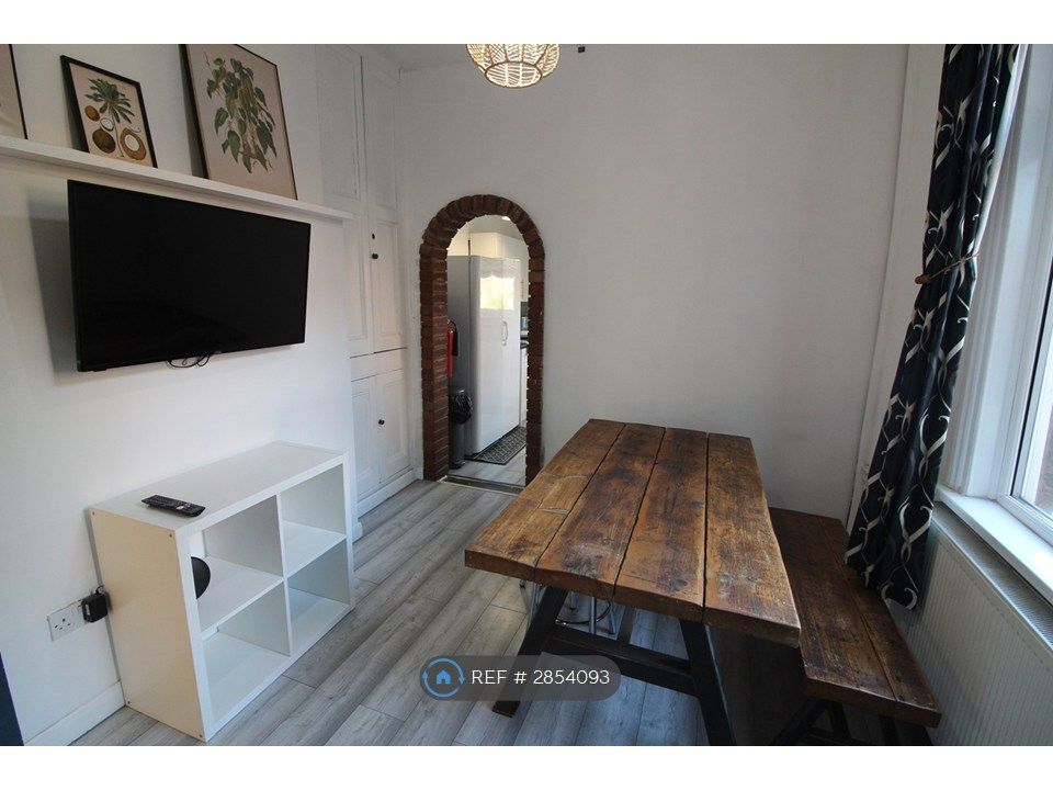 Property photo 2 of 12 Dining Room (Angle 1)