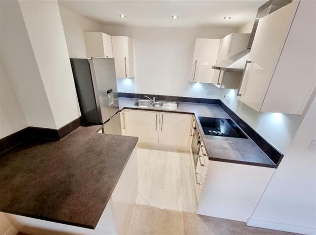 Property photo 3 of 13 Kitchen