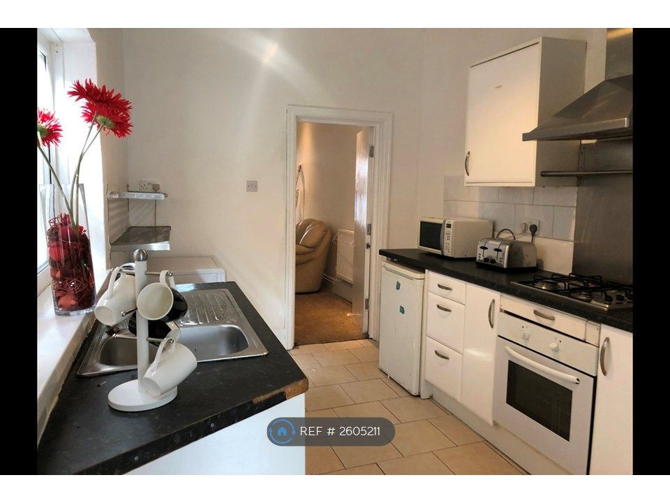 Property photo 1 of 9 Full Kitchen