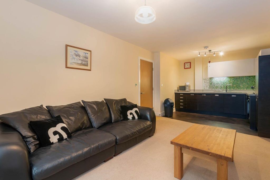 Property photo 2 of 11 Living Area