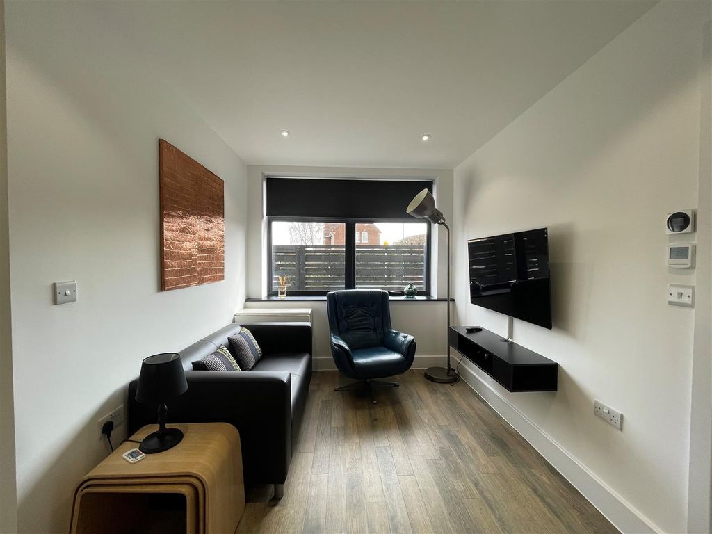 Property photo 3 of 8 Living Area.Jpg