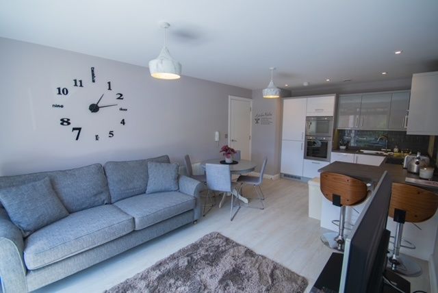 Property photo 3 of 8 Bright, Modern Open-Plan Living Area With A Comfor...