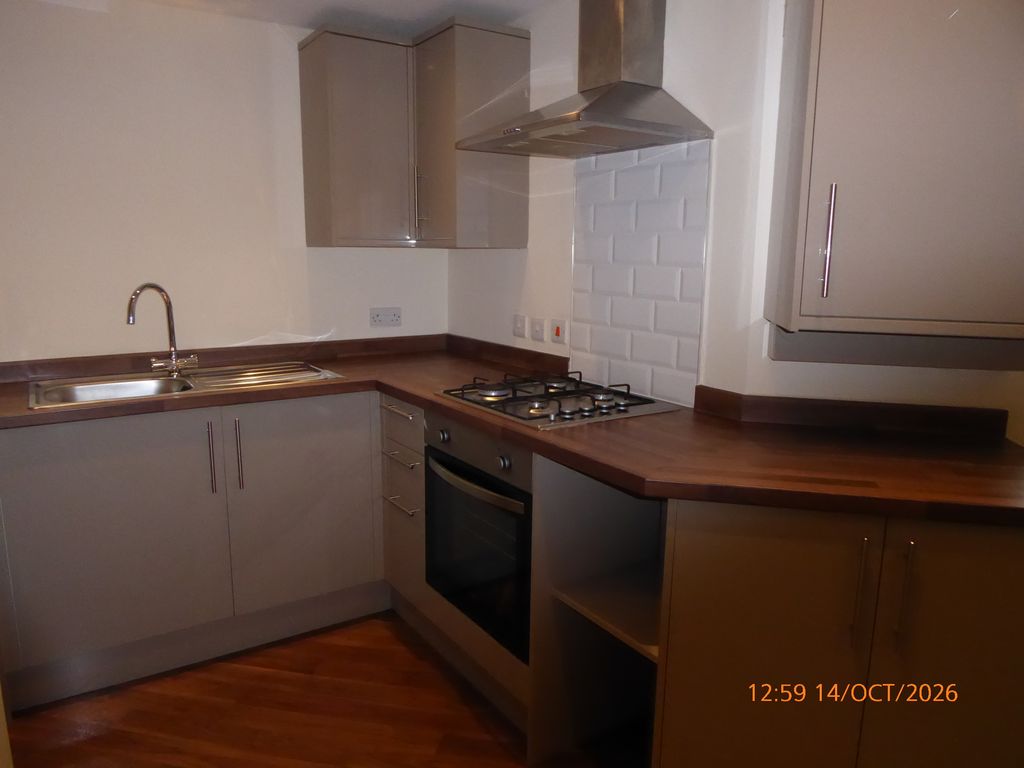 Property photo 1 of 6 Kitchen Area