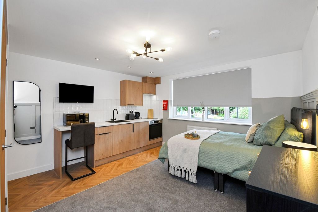 Property photo 1 of 7 Bright And Modern Living Area Featuring A Spacious...
