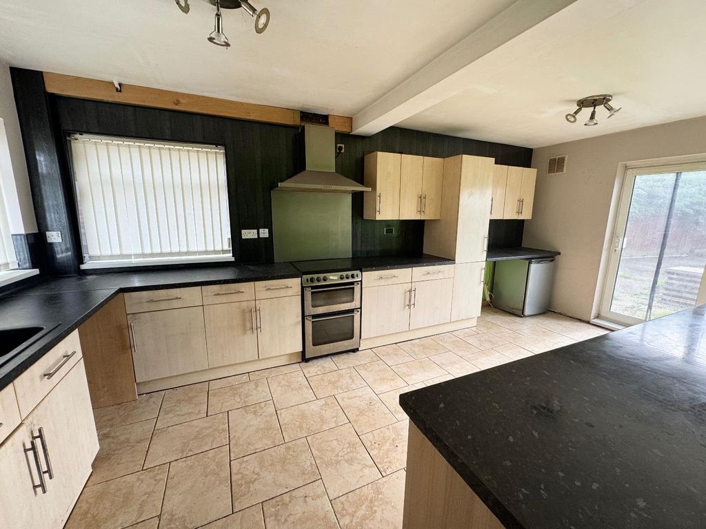 Property photo 2 of 14 Dining Kitchen