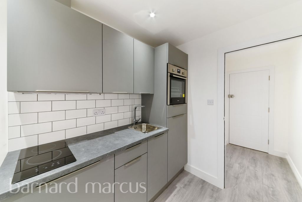 Property photo 1 of 8 Kitchen