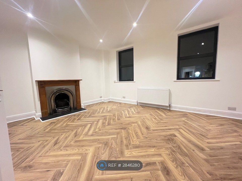 Property photo 3 of 28 Lounge With Feature Fireplace