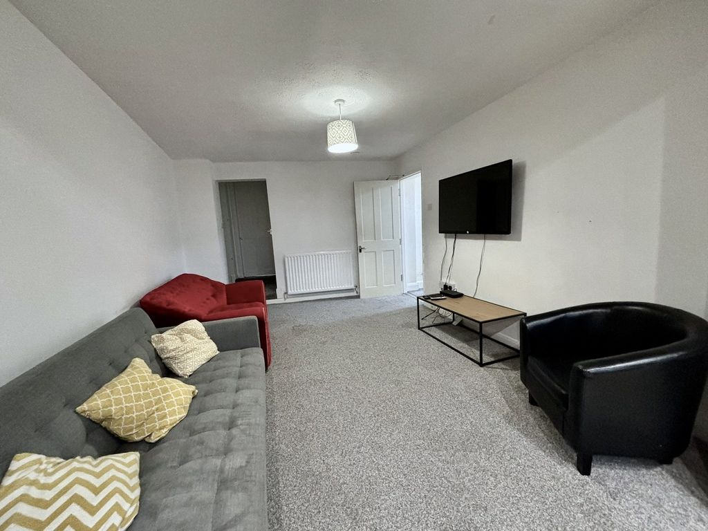 Property photo 3 of 13 A Spacious And Inviting Modern Living Room Perfect...