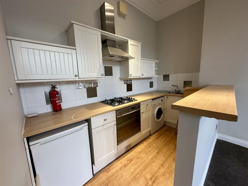 Property photo 3 of 9 Kitchen Area
