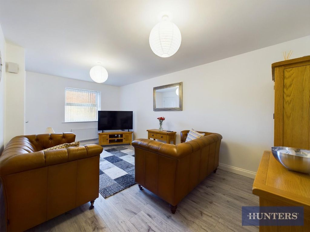 Property photo 3 of 18 Living Area