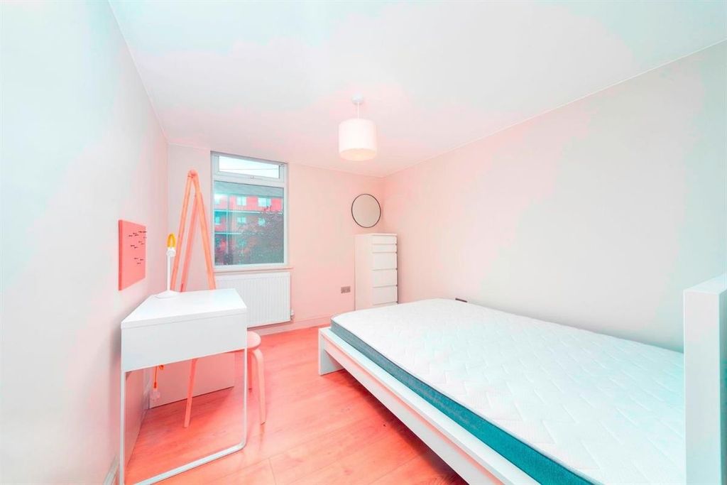 Property photo 3 of 7 Bright, Simple Bedroom With Desk And Storage...