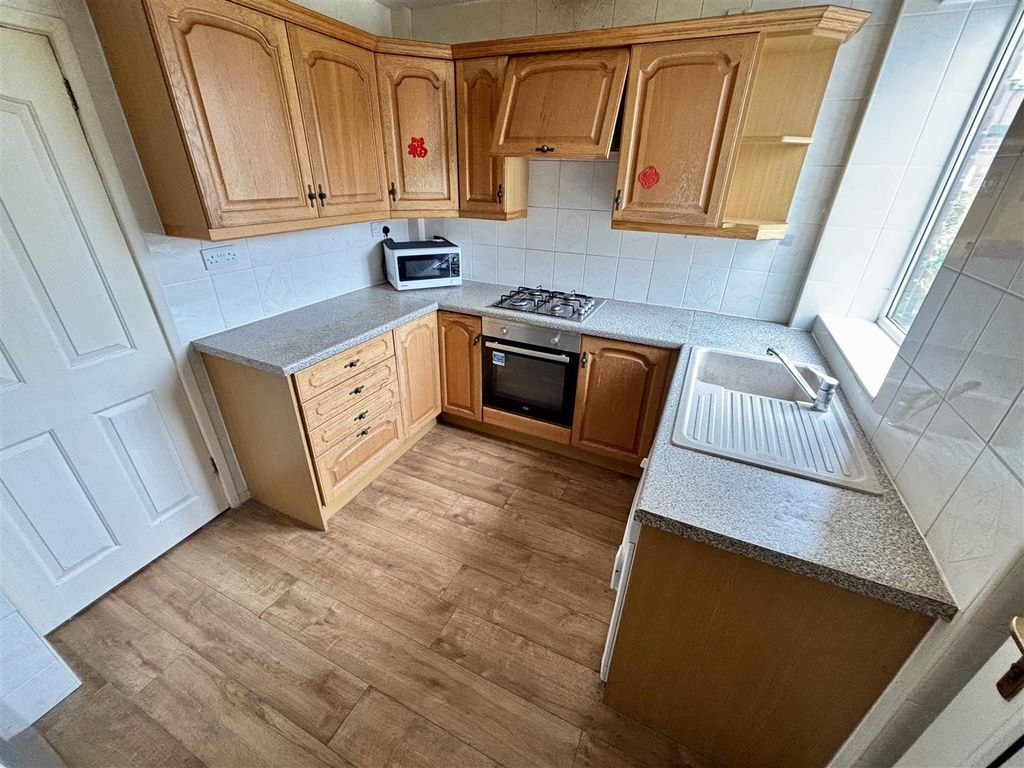 Property photo 3 of 13 Kitchen