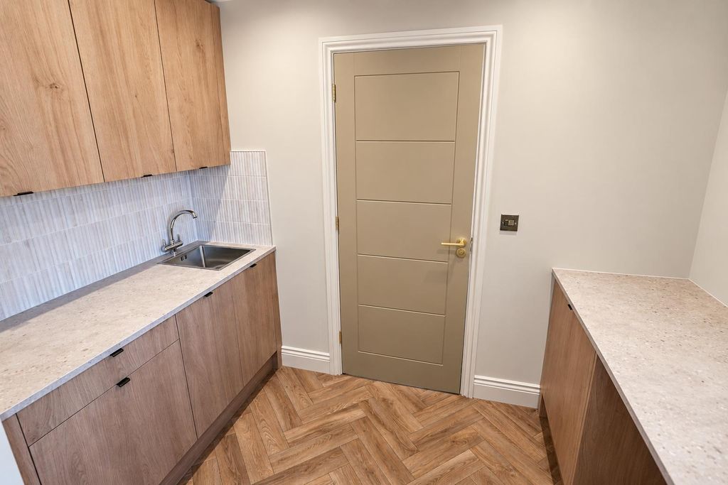 Property photo 3 of 12 Utility Room.Png