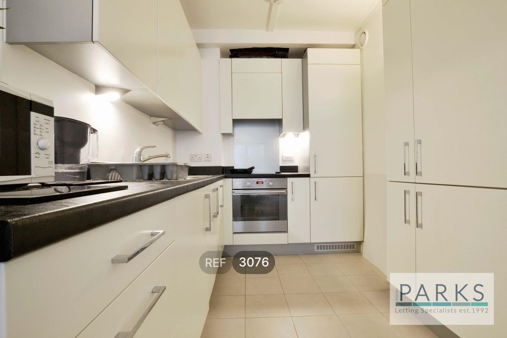 Property photo 2 of 8 Kitchen &amp; Living Area