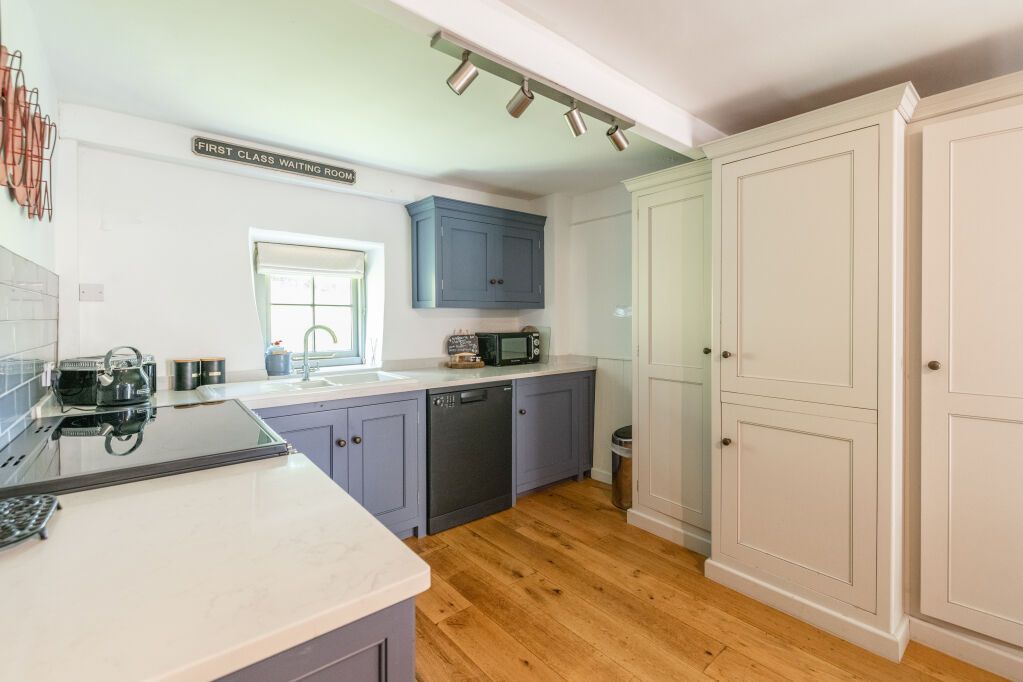 Property photo 2 of 17 Kitchen Area
