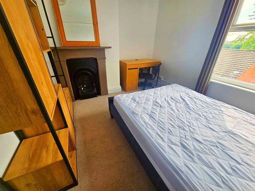 Property photo 3 of 21 A Bright And Tidy Bedroom Featuring A Comfortable ...